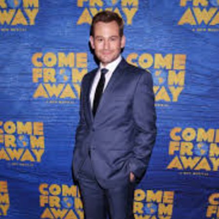 Chad at the premiere of Come From Away in blue suit